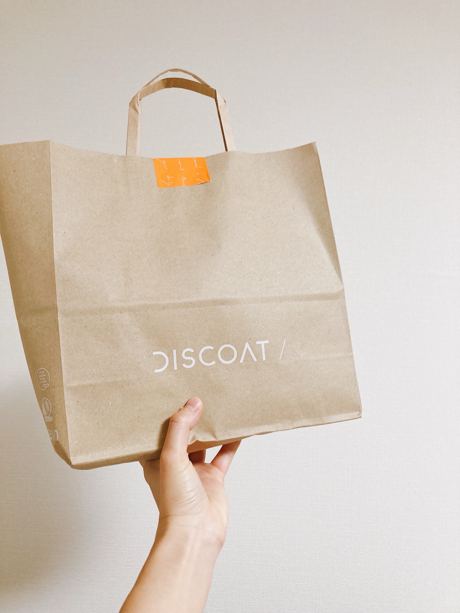 Discoatの紙袋